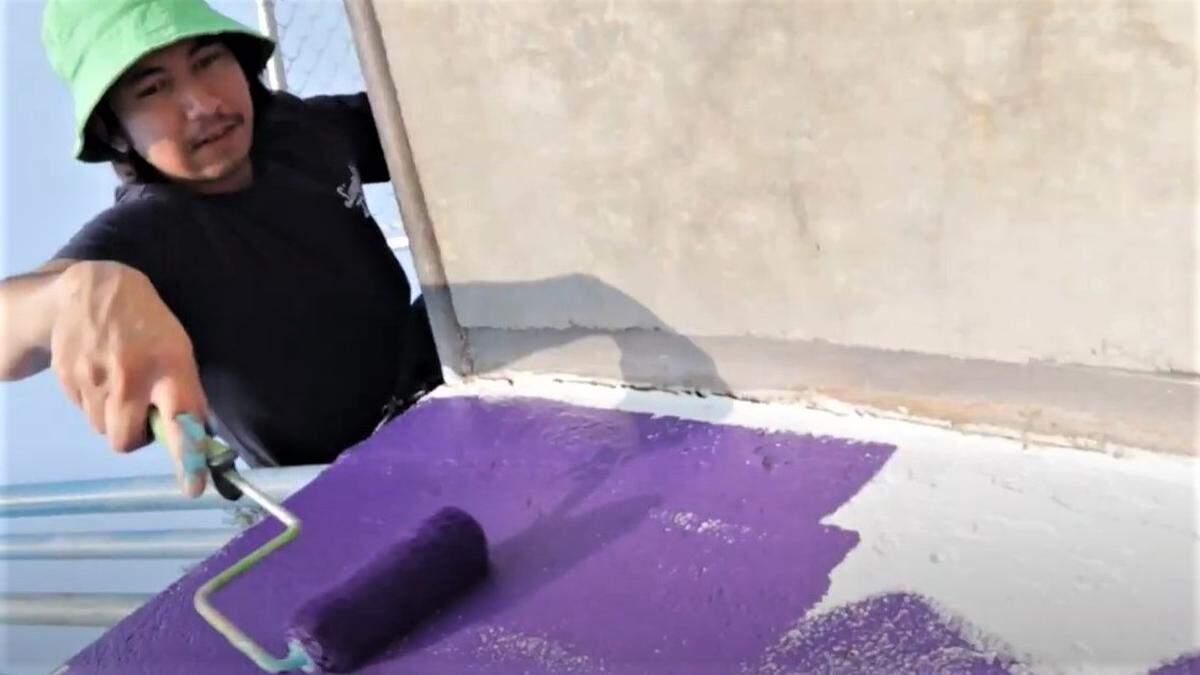 Miguel Almeida, 30, begins to paint a mural at Tully Park in Meridian. The city contracted with him to paint the mural at the skate park.