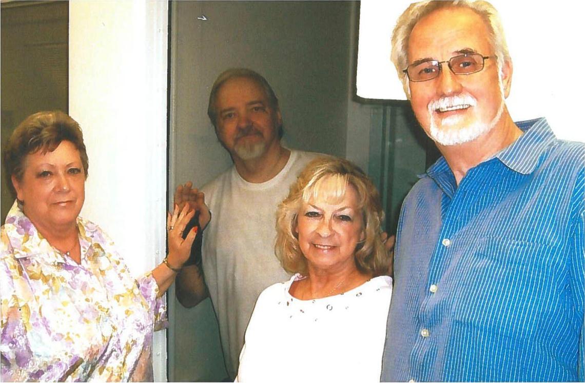 Death row prisoner Thomas Creech, center left, awaits a clemency hearing before the Idaho Commission of Pardons and Parole on Jan. 19, 2024. He is pictured here with (from left to right) his wife, LeAnn Creech, his older sister, Virginia Plageman, and his sister’s late husband, Michael Plagemen, in the visiting area at the Idaho Maximum Security Institution in Kuna in 1999.