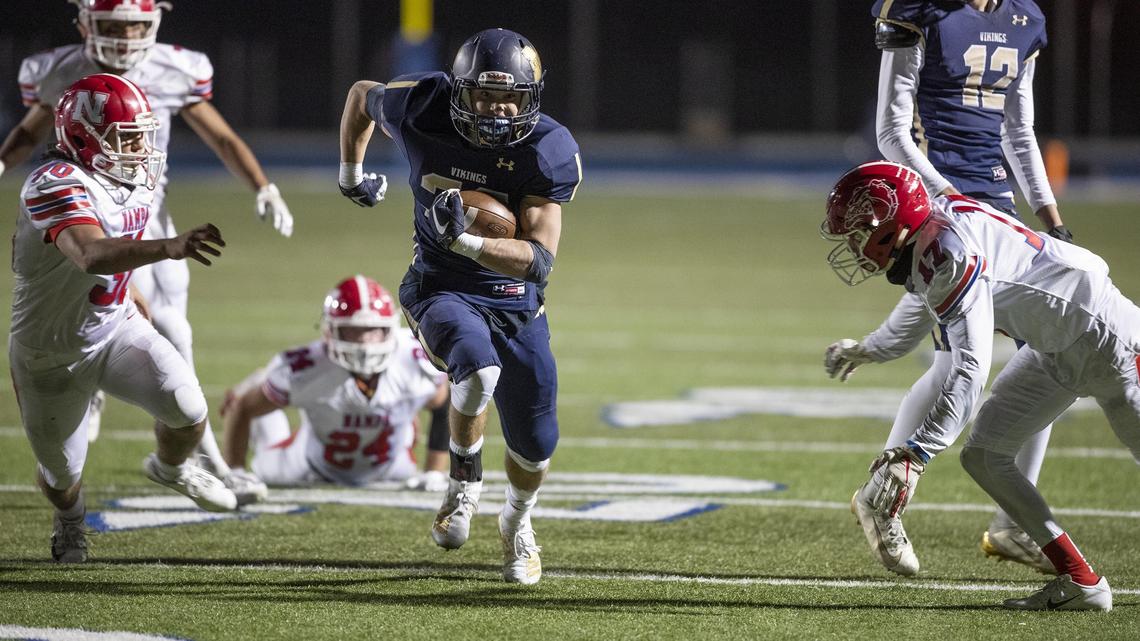 Middleton running back Trenton Johansen finds a gap in Nampa’s defense and scores a touchdown in the fourth quarter Friday, Oct. 11, 2019, at Middleton High.