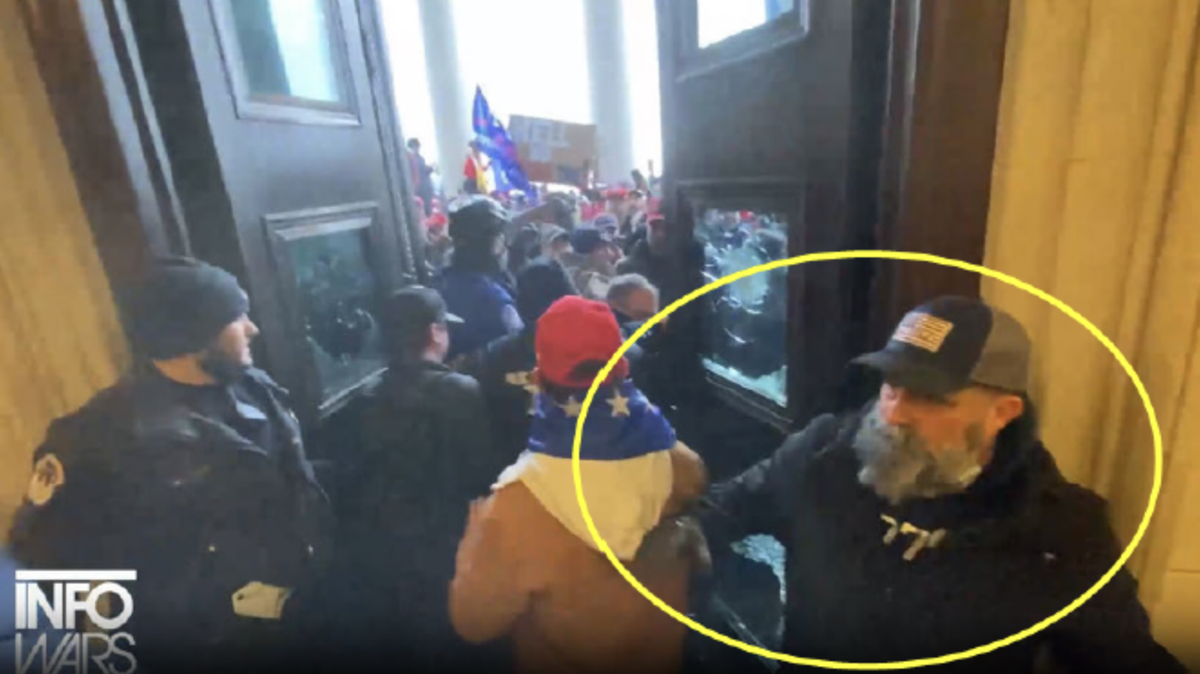 Theo Hanson is seen here after illegally entering the U.S. Capitol on Jan. 6, 2021, authorities say. He was arrested Thursday in Nampa.