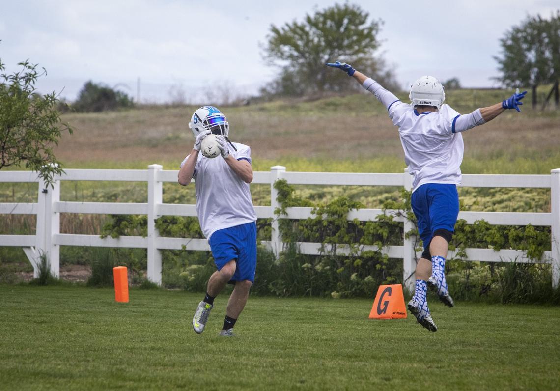 Mike Csencsits, a Capital High School graduate and now an Idaho Horsemen, makes a catch in spite of Cooper Smith’s defensive jump.