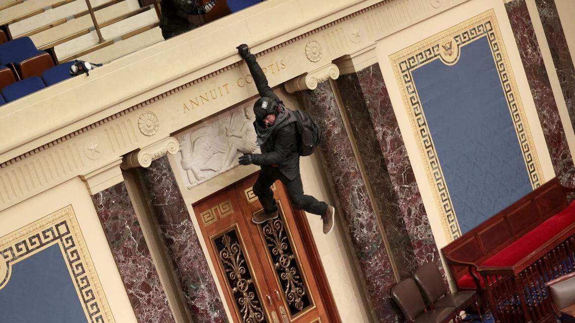 Boise-area resident Josiah Colt descends from the public gallery to the floor of the Senate chamber at the U.S. Capitol during the Jan. 6 insurrection.