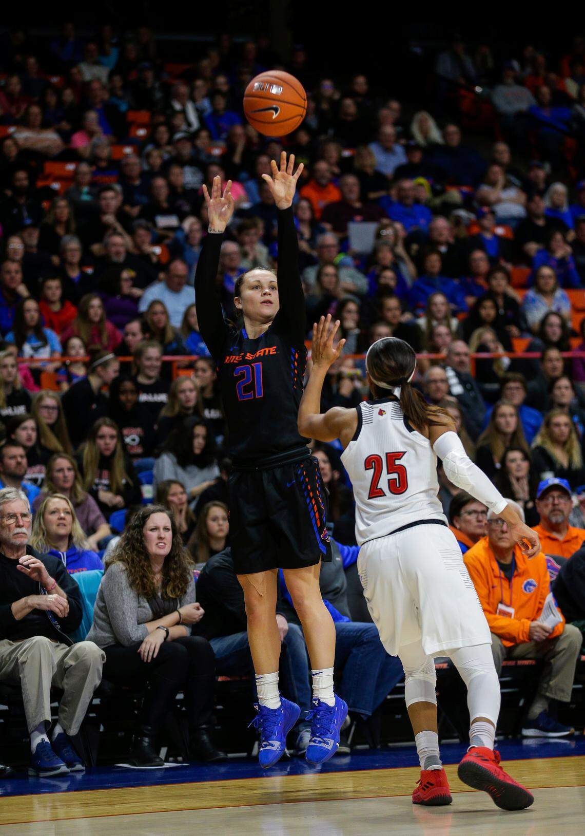 Boise State guard Riley Lupfer makes a 3-point shot over Louisville guard Asia Durr on Nov. 19, 2018, in Boise. Lupfer owns the Broncos’ single-season record for made 3-pointers (122) and is closing in on the career record.