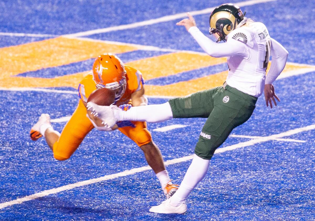 Boise State cornerback Avery Williams blocks a punt by Colorado State's Ryan Stonehouse on Thursday. The block was returned for a touchdown.