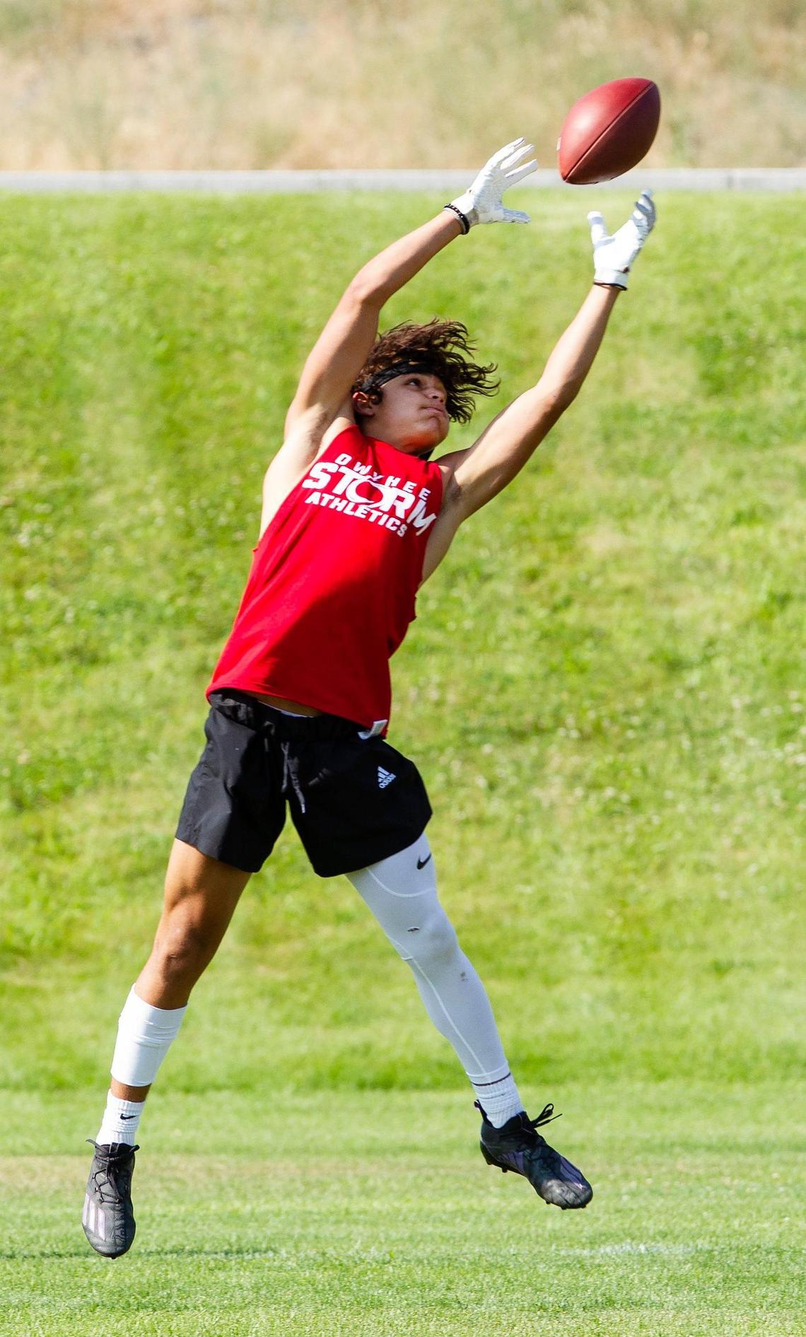 Owyhee’s Cade Walker stretches to haul in a touchdown catch at the Famous Idaho Potato Bowl 7-on-7 Tournament on Friday.