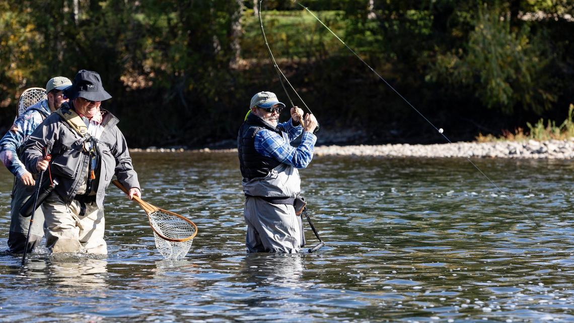 Richard Seltzer of Caldwell reels in a fish as he learns how to fly fish on Oct. 9, 2021, in the Boise River during a day retreat with Idaho2Fly, a nonprofit that helps men with cancer connect with one another through fly fishing. The group is looking for more applicants for its retreats.