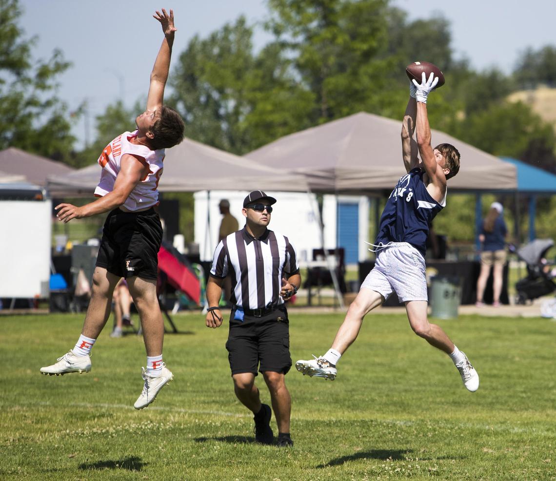 Skyview wide receiver Dustin Bentley catches a touchdown over the head of Fruitland’s Cole Eiguren during the quarterfinals of the Potato Bowl 7-on-7 Tournament.