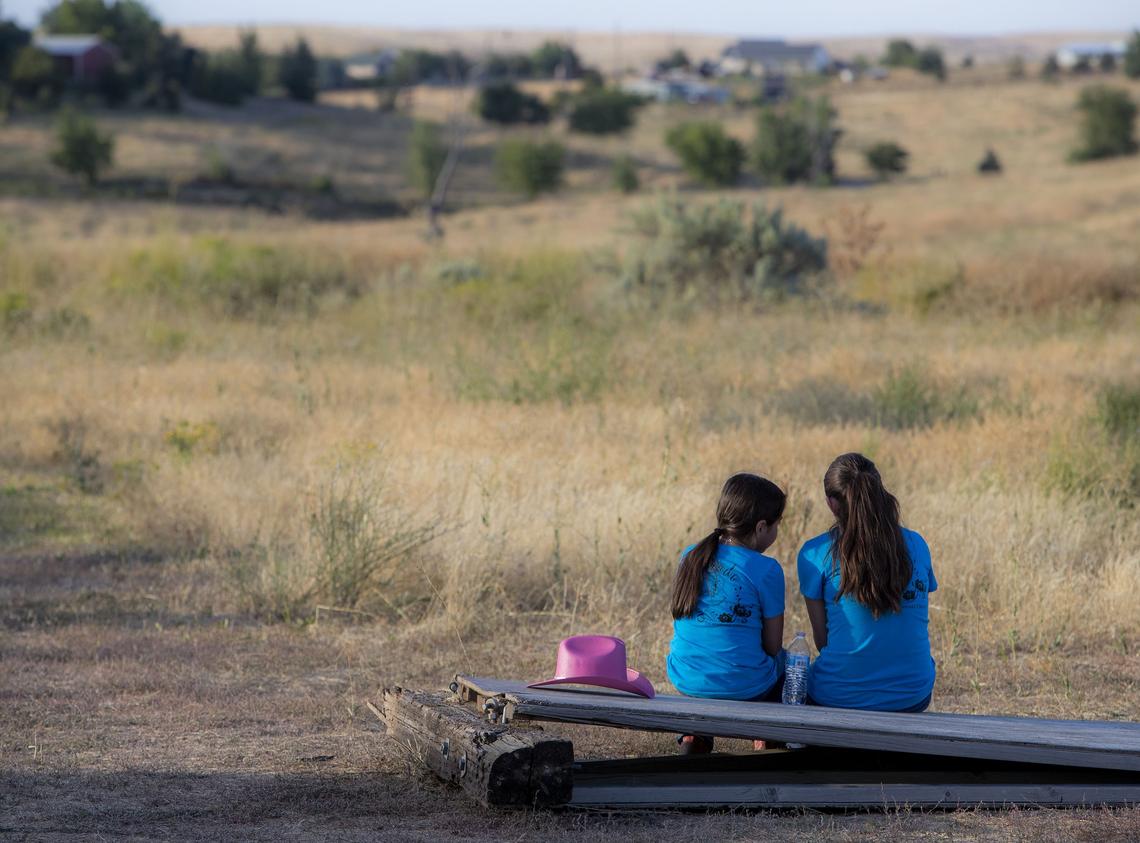 Bianca Villa, 9, and Paloma Sanchez, 13, (Paloma’s daughter) wear the official practice shirts of Escaramuza Charra Sueño Dorado and hope to be on the riding team someday.