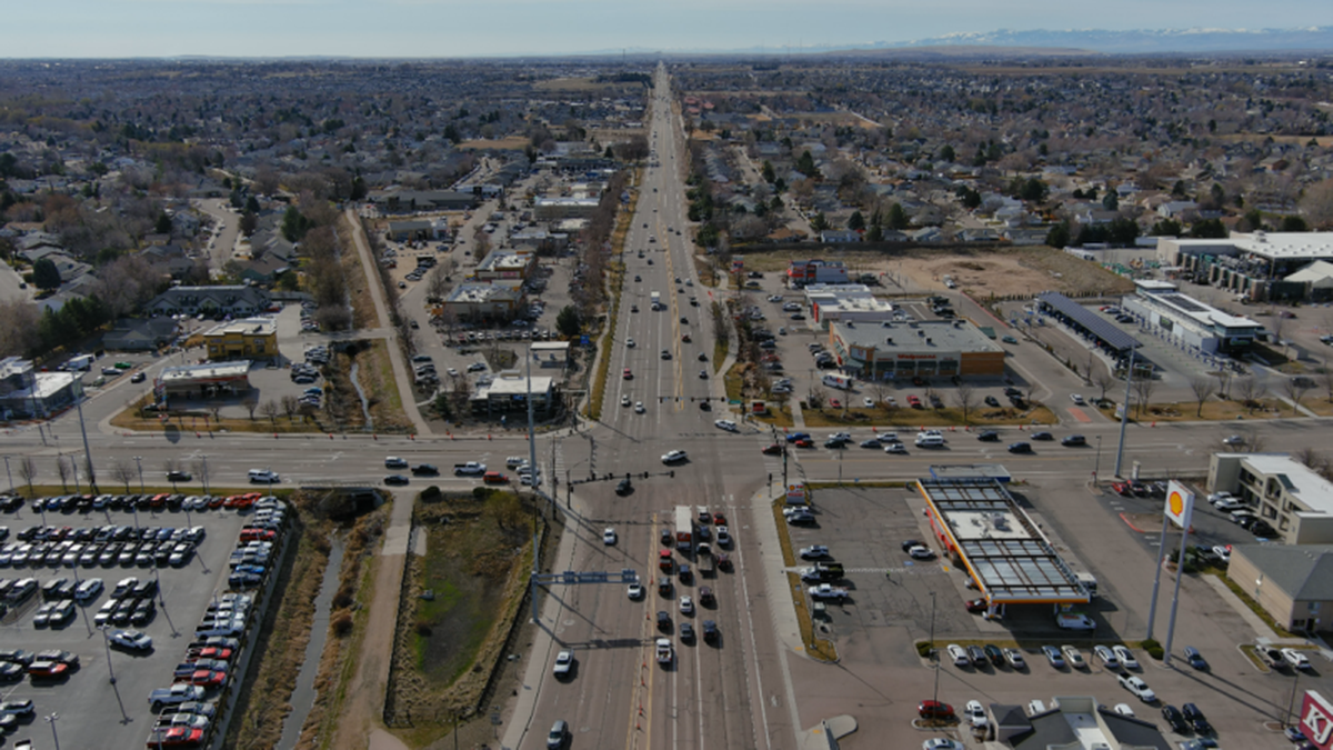 The Idaho Transportation is chip-sealing Meridian Road, shown here at its intersection with Overland Road, to improve the roadway’s longevity. The department later may widen the road and extend it further south as it prepares for the next few decades of growth.