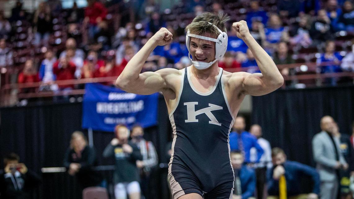 Kuna senior Hunter Mitchell celebrates his fourth state title with a 6-2 decision over Meridian’s Nathan Gregory in the 5A, 138-pound championship Friday at the Ford Idaho Center in Nampa.