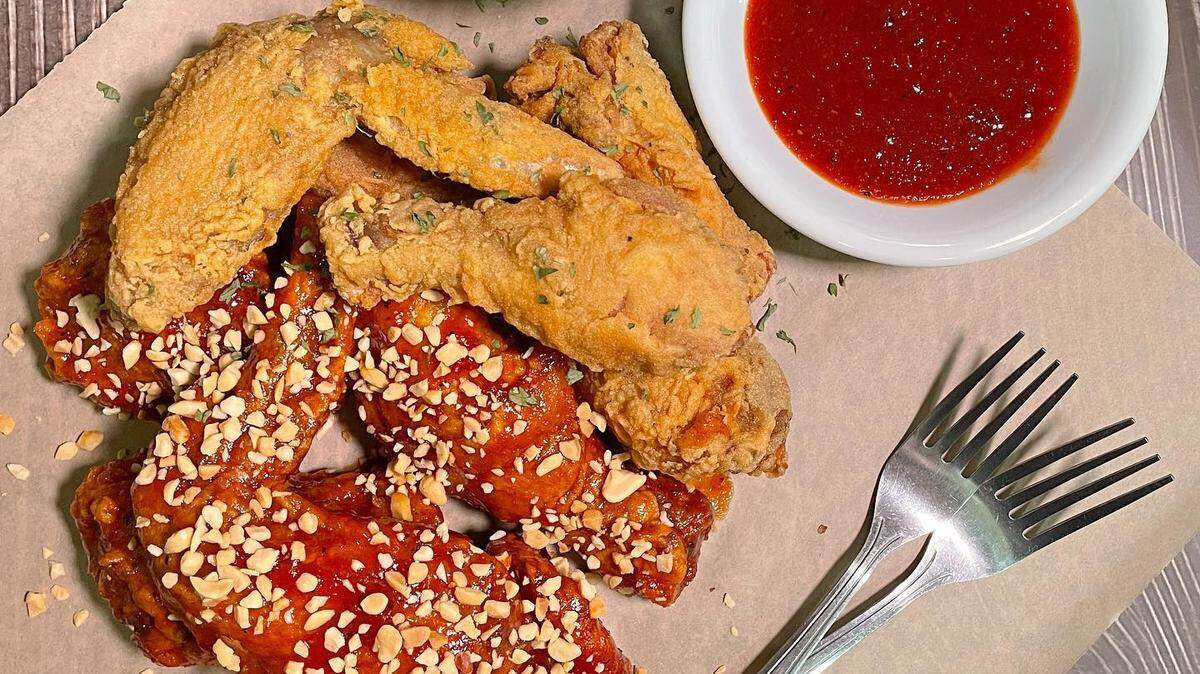 Korean fried chicken is the specialty at Han’s Chimaek in Boise. Pictured are fried, top, and yangnyeom-sauced, bottom.