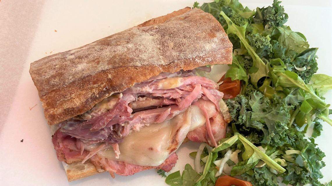 The Devil sandwich ($10): House-cured and smoked ham with roasted pork, melted Gruyere cheese, grain mustard, Tasso mayonnaise and pickled onion on Acme Bakeshop ciabatta. It comes with house salad.