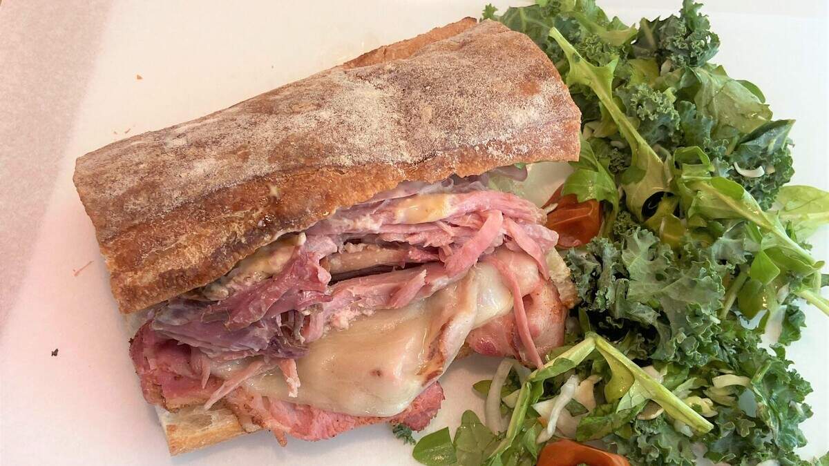 The Devil sandwich ($10): House-cured and smoked ham with roasted pork, melted Gruyere cheese, grain mustard, Tasso mayonnaise and pickled onion on Acme Bakeshop ciabatta. It comes with house salad.