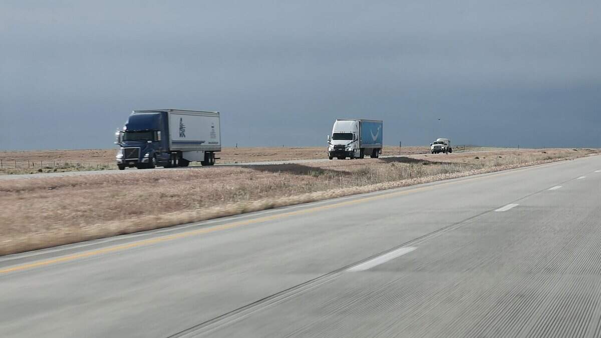Trucks travel west on I-84 into the Treasure Valley, May 17, 2026. A new state law will do away with lower speed limits for trucks on Idaho's interstate highways. In some places, that means trucks weighing 26,000 pounds and more will be able to travel 80 miles per hour.
