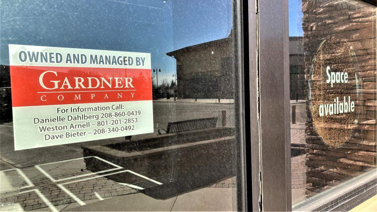 Signs at one of the numerous vacant retail spaces in the Nampa Gateway Center on Saturday.