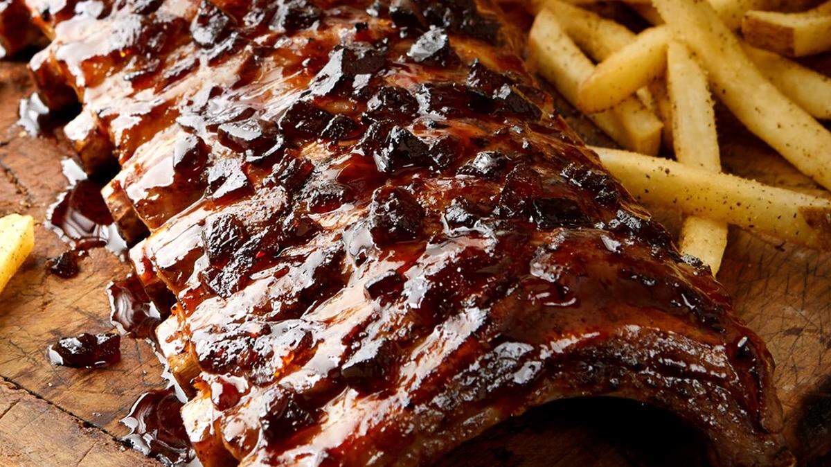 Whiskey-glazed ribs and fries are favorites at TGI Fridays.