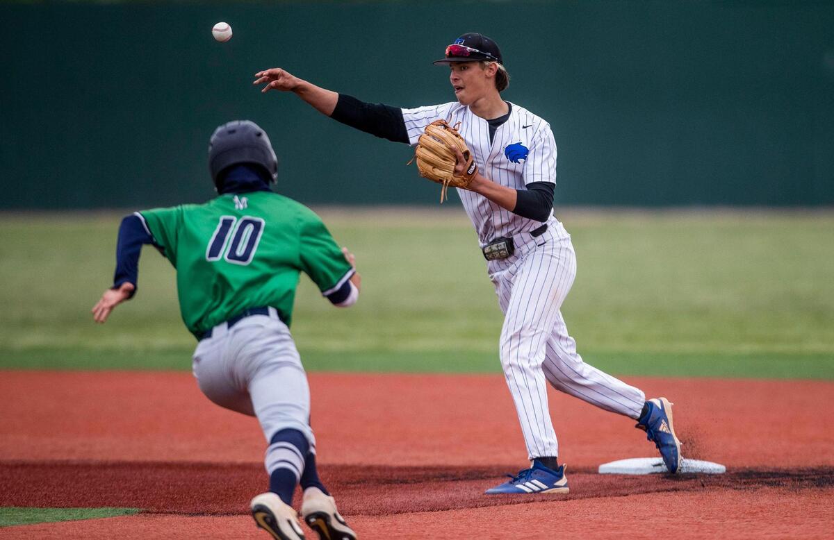Timberline senior Greyson Shafer, right, was one of six Wolves voted to the 5A SIC all-conference first team.