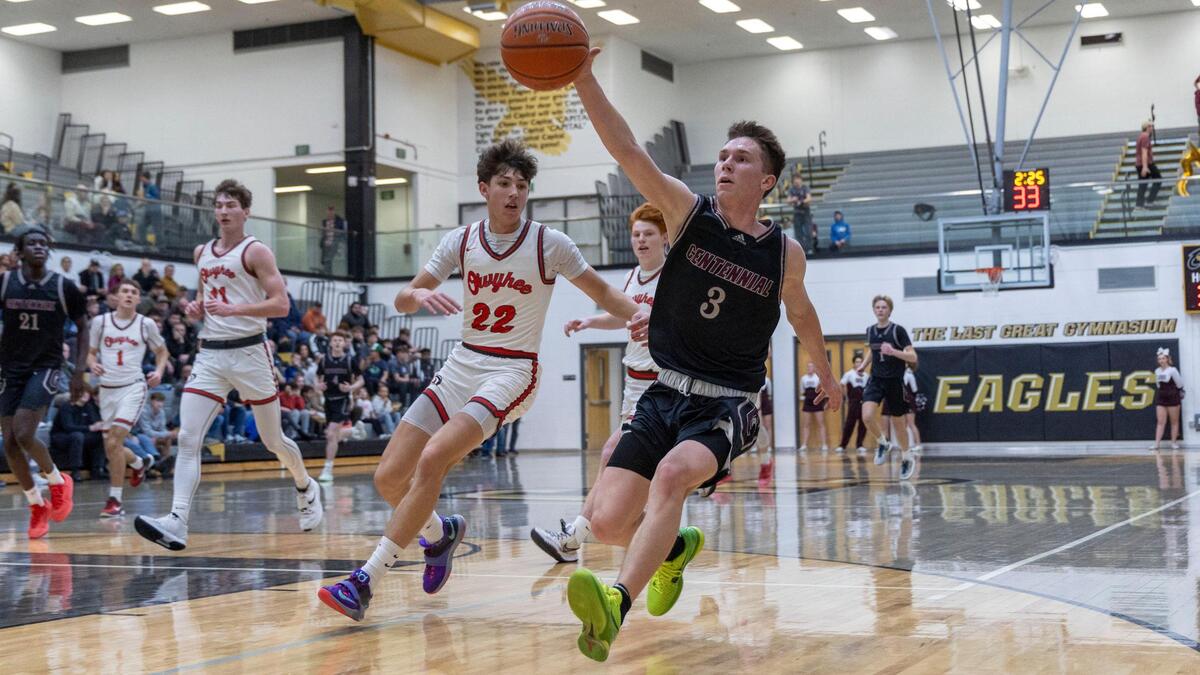 Centennial guard Payton Knudson chases down a long pass in the district semifinals last season.