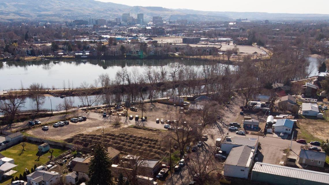 A developer plans to add another chapter to the riverside growth in Garden City near Quinn’s Pond (shown on the far side of the Boise River) and the Greenbelt with two developments, including one on the bare ground shown here at the end of 34th Street.