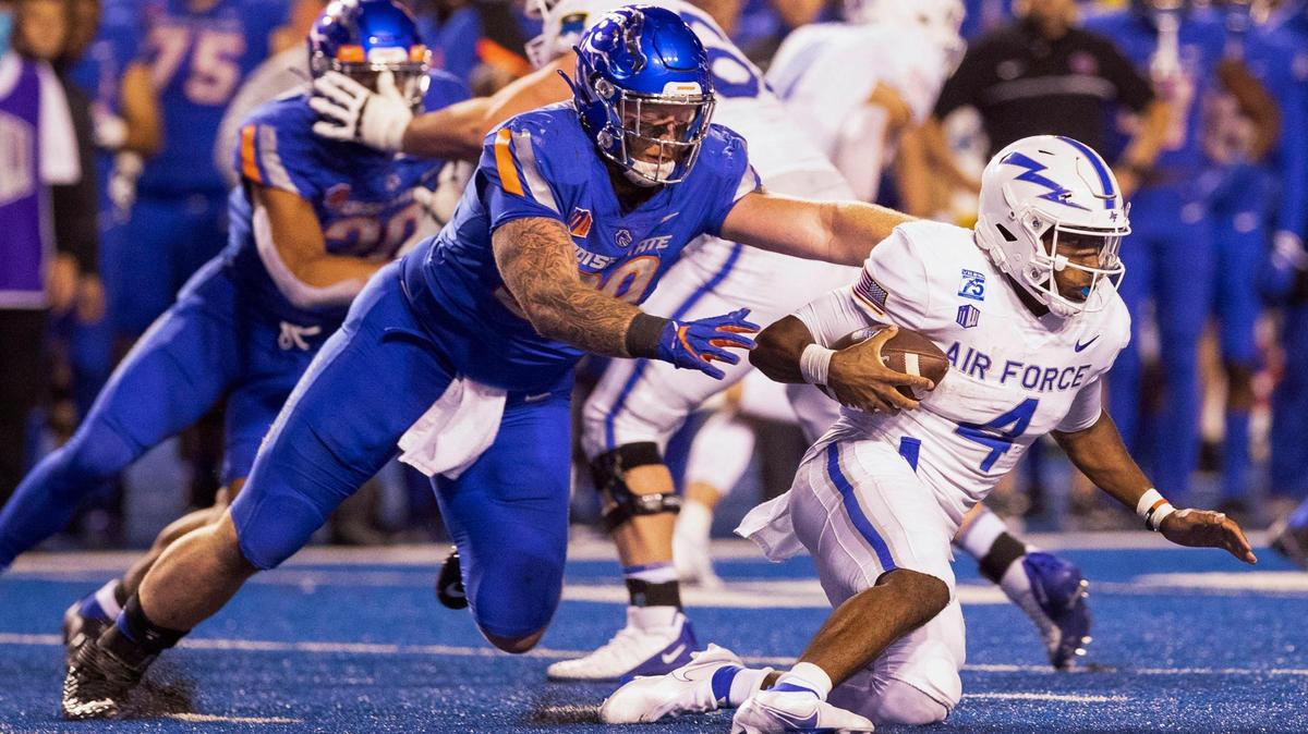 Former Boise State defensive tackle Scott Matlock sacks former Air Force quarterback Haaziq Daniels during a game in 2022. Matlock started 32 games at Boise State since 2020.