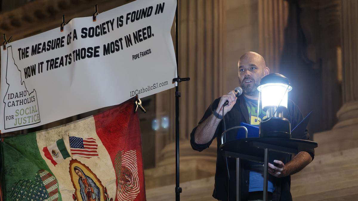 Anthony Paz speaks at a vigil for immigrants held by Idaho Catholics for Social Justice outside of the Capitol Building in downtown Boise, Thursday, Nov. 13, 2025. Thursday marked the feast day of St. Frances Xavier Cabrini, the patron saint of immigrants.