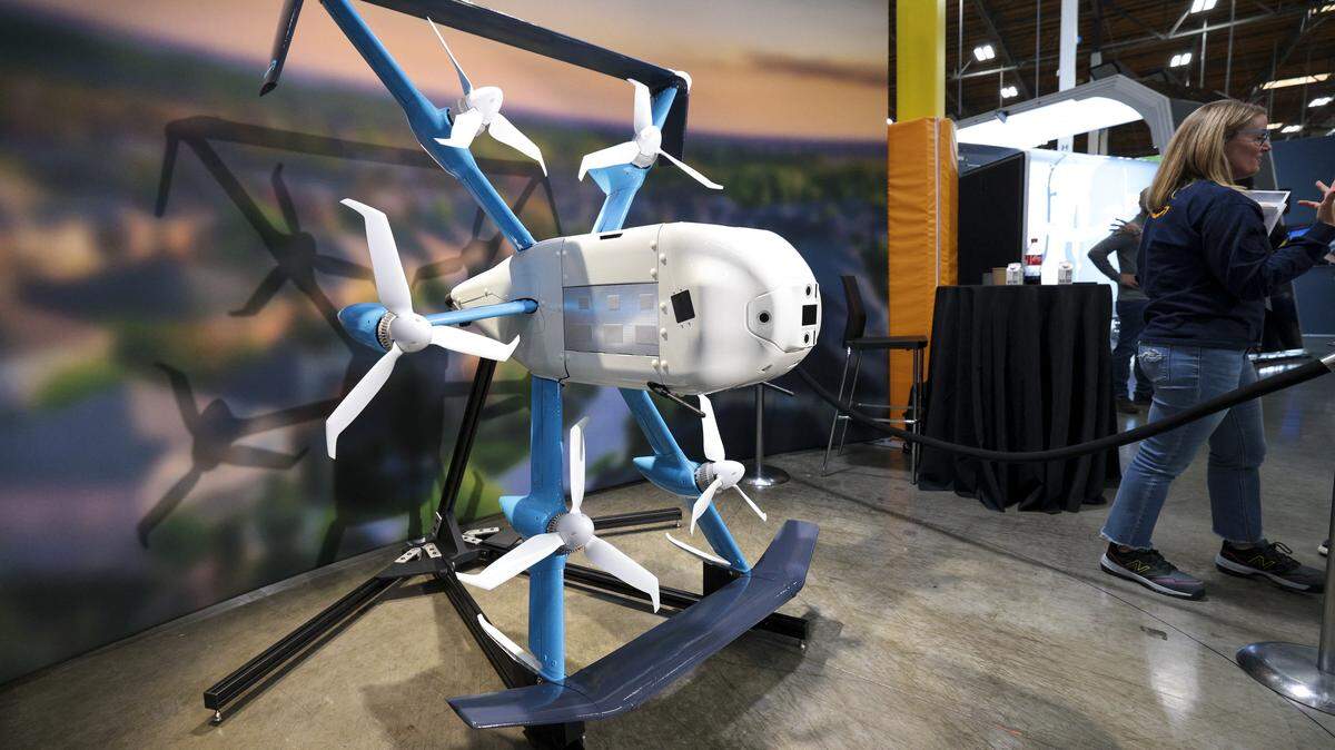 Amazon's MK30 Prime Air drone is displayed during Amazon's "Delivering the Future" event at the company's BFI1 Fulfillment Center, Robotics Research and Development Hub in Sumner, Washington, in 2023. 