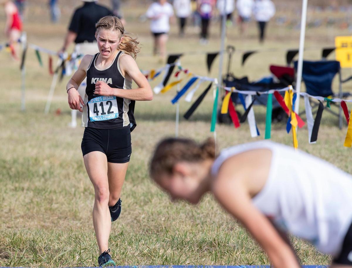 Kuna’s Malia Lowe cross the finish line in fourth place at the 5A state meet.