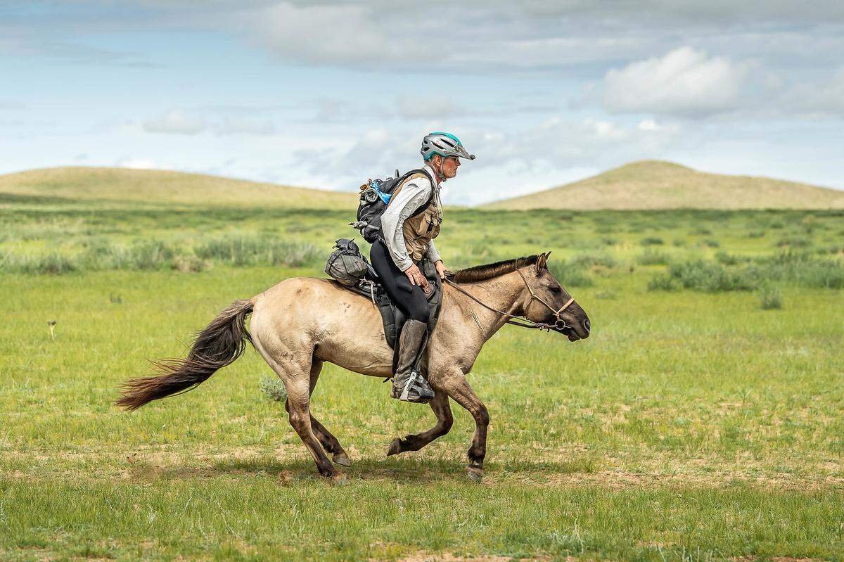 Robert Long, of Boise, rides across the Mongolian Steppe during the sixth day of the Mongol Derby. Long, 70, won the race, meant to replicate the route used by Genghis Khan’s postal delivery riders.