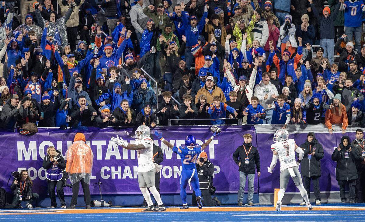 Boise State running back Dylan Riley celebrates a touchdown catch against UNLV in the Mountain West title game.