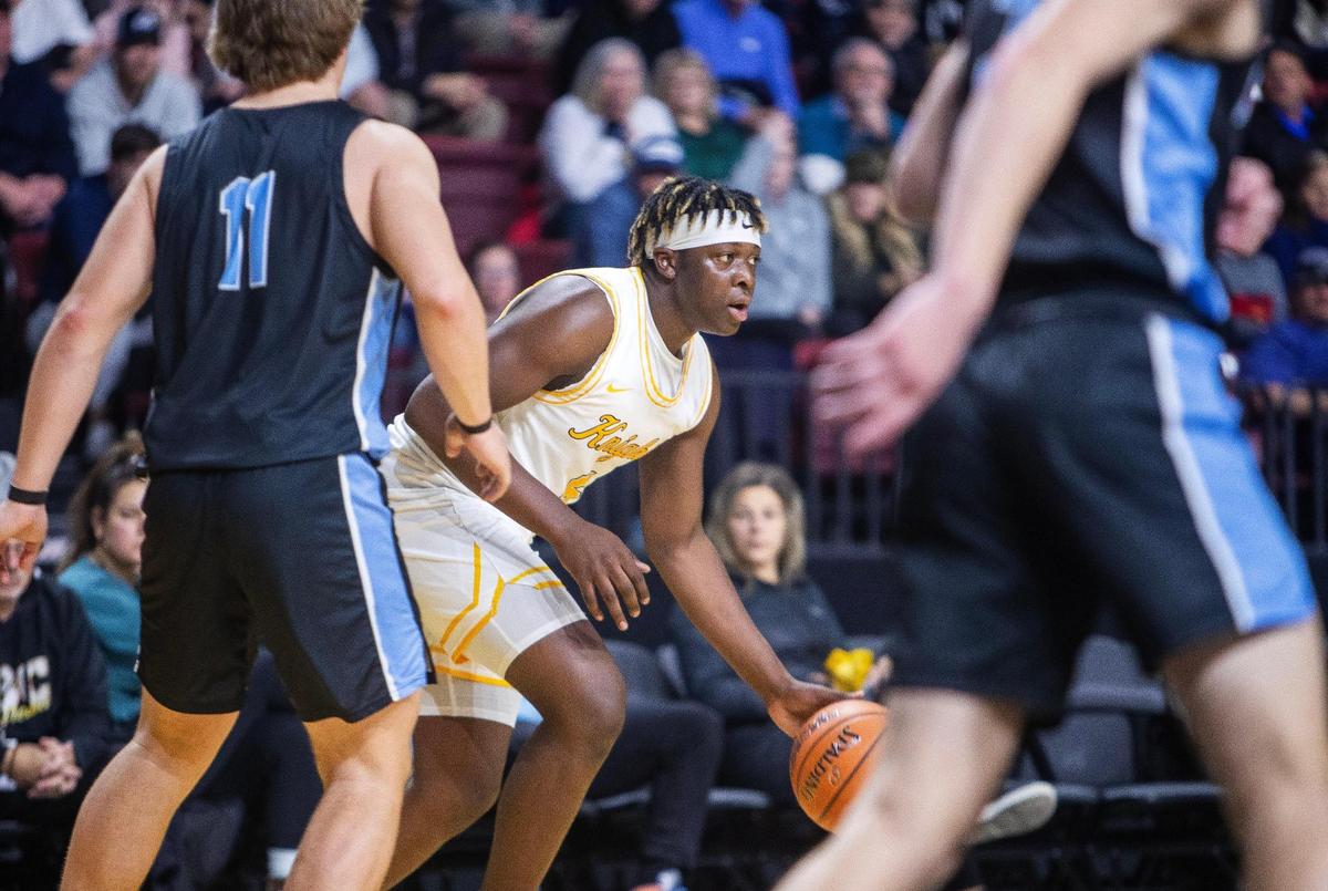 Bishop Kelly senior Rakeem Johnson will play football at Oregon State but returns for the Knights’ boys basketball team.