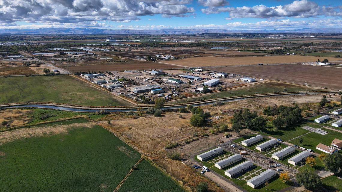 The urban renewal district includes nearly 1,000 acres north of town near Highway 20-26. The bottom right of the photos shows Farmway Village, a Caldwell Housing Authority project. Farmway Village is included in the urban renewal district.
