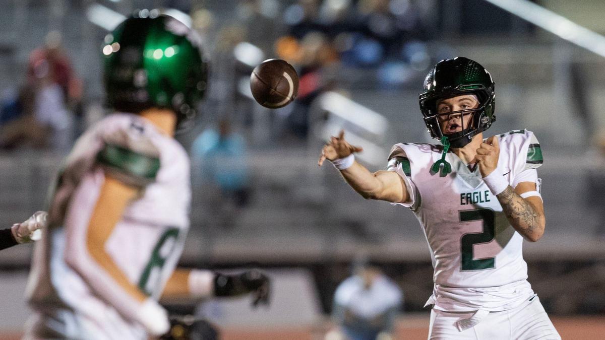 Eagle quarterback Austin Ramsey passes to tight end Landon Bult earlier this season in a win over Boise. The Mustangs (9-2) face Rigby (10-1) at 2 p.m. Saturday at Boise State’s Albertsons Stadium in the 6A state championship game.