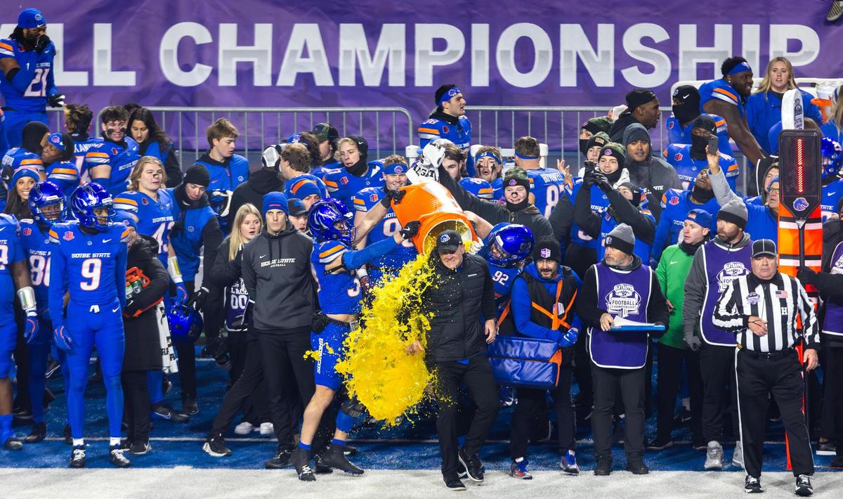 Boise State Broncos dump a cooler of Gatorade on Coach Spencer Danielson as time runs out in the Mountain West championship game.