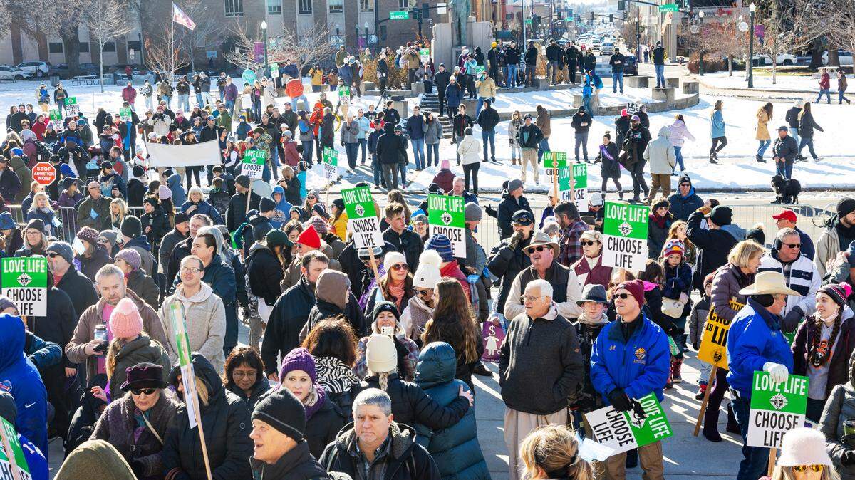 Demonstrators gather near the Idaho Capitol Building for the Boise March for Life rally on Saturday, Jan. 21, 2023. On this 50th year of March for Life, attendees celebrated the June 2022 overturn of the Roe v. Wade decision and abortion’s now illegal status in Idaho.