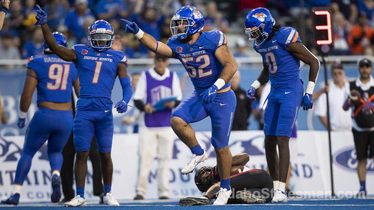 Boise State linebacker DJ Schramm celebrates forcing San Diego State to punt after a tackle in the 1st quarter, Sept. 30, 2022, at Albertsons Stadium in Boise.