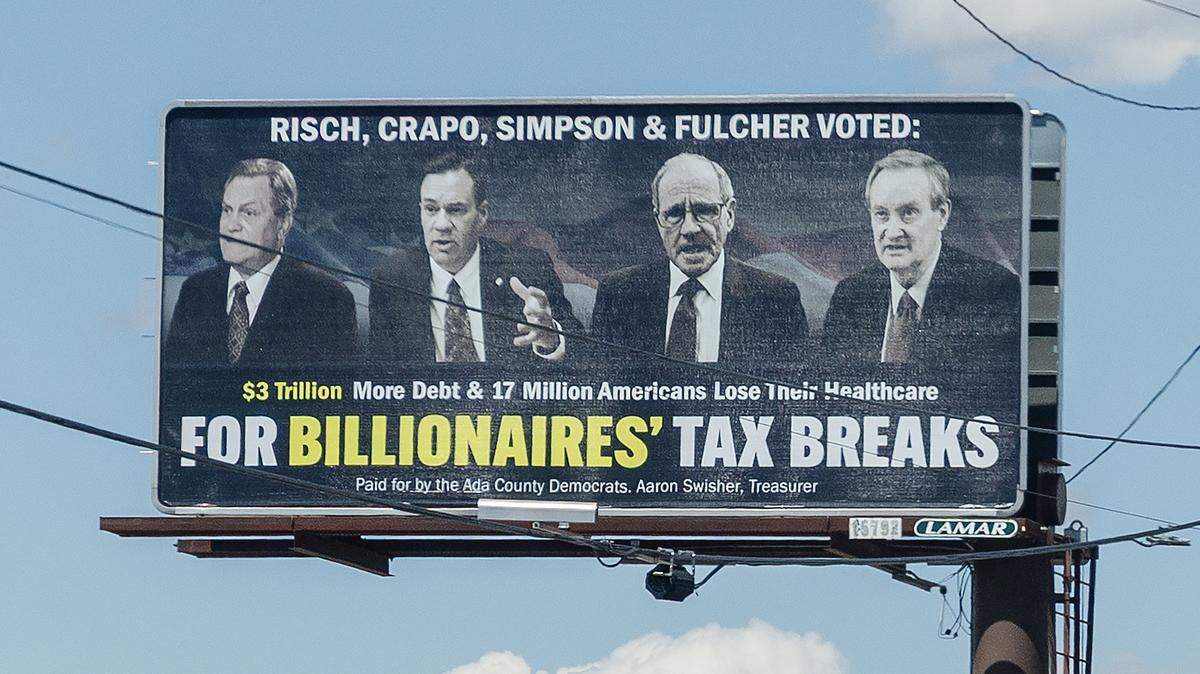 Ada County Democrats have unveiled billboards, including this one on Curtis Road in Boise, targeting Idaho Republicans’ support for tax breaks and health care cuts.