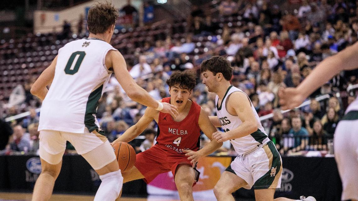Melba’s Gabe Shaffer looks for open room against St. Maries during last year’s 2A state championship game.