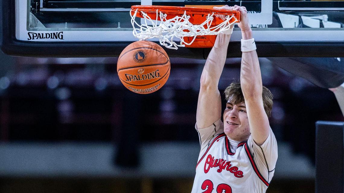 Owyhee guard Boden Howell throws down a fourth-quarter dunk Thursday in a 49-40 win over Borah in the first round of the 6A state tournament.