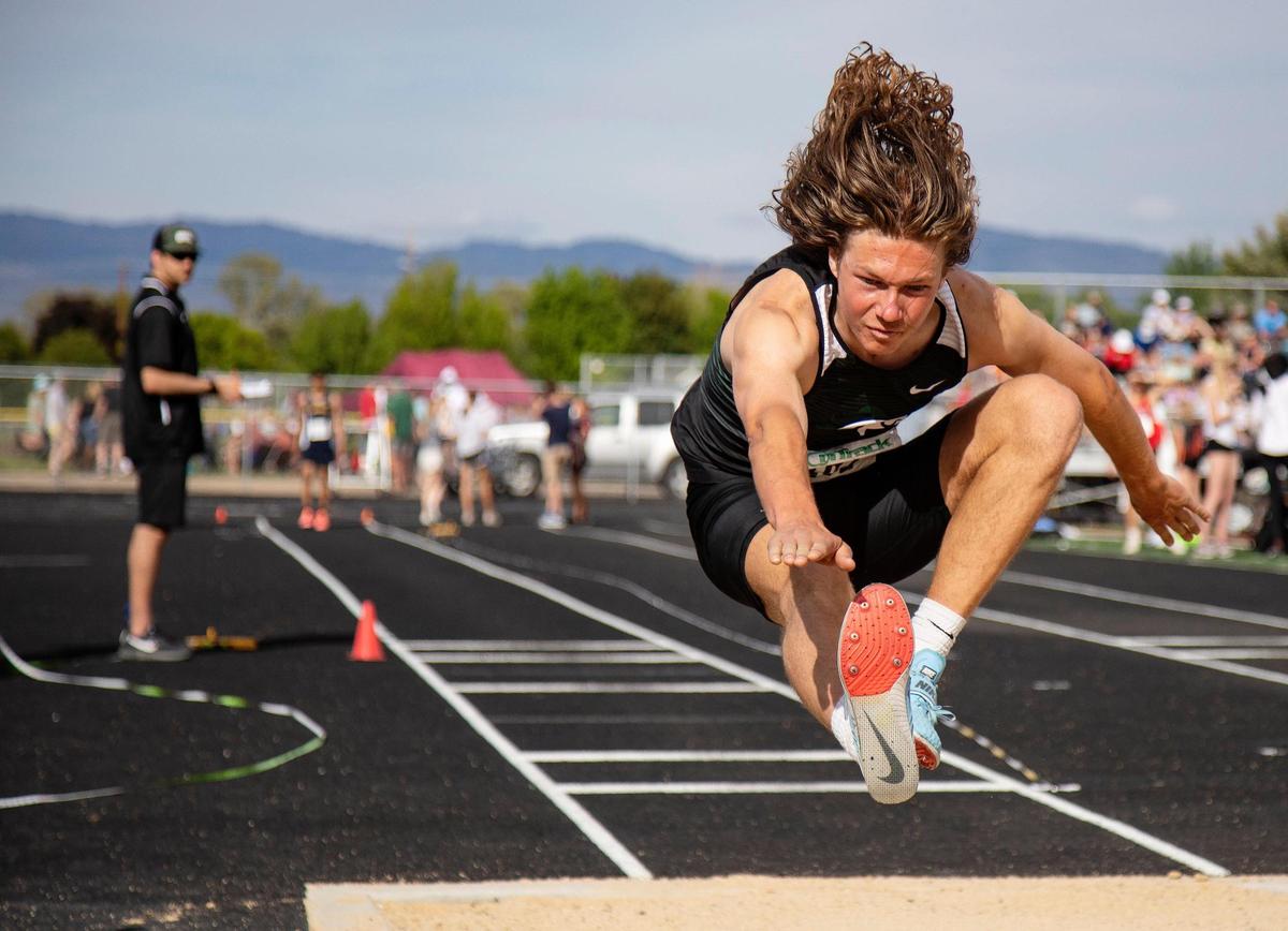 Eagle’s Barrett Davis is the reigning 5A state long jump champ but will also contend in the triple jump, pictured above.