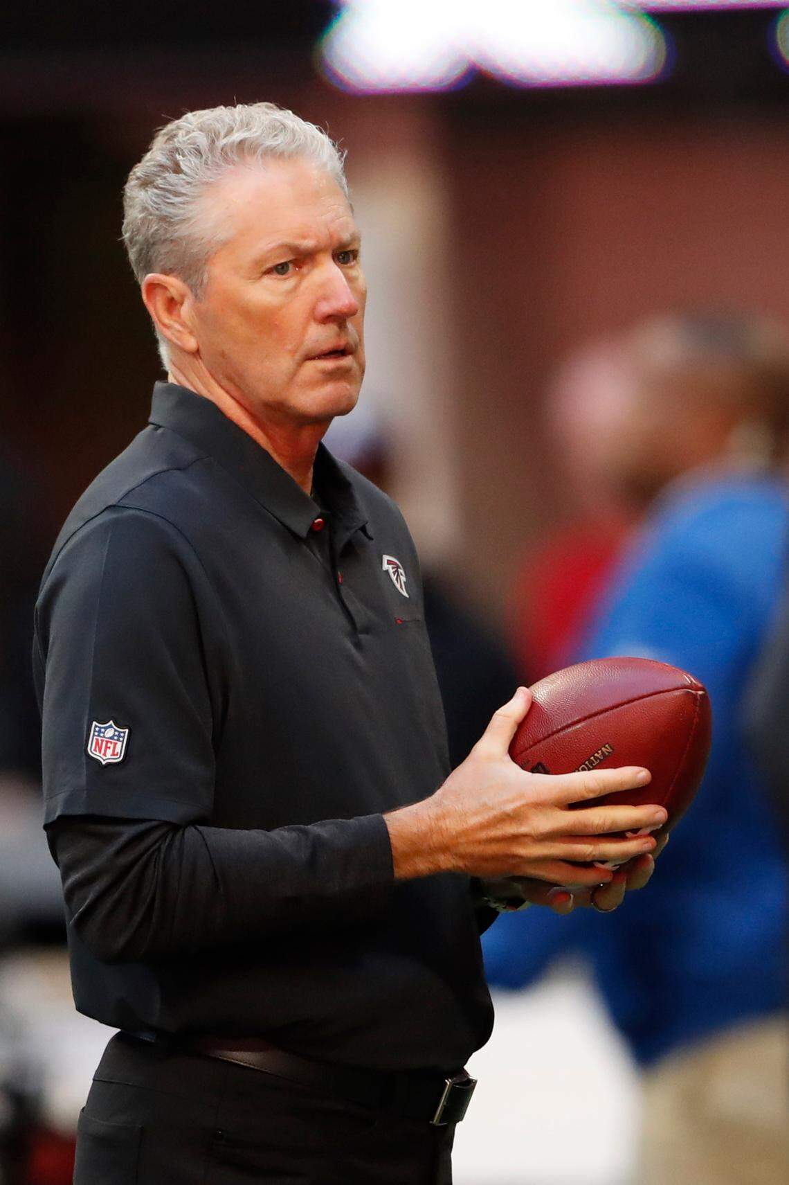 Atlanta Falcons offensive coordinator Dirk Koetter watches teams warm up before an October game against the Seattle Seahawks. Koetter was previously a finalist for the Boise State job and led the Broncos from 1998-2000.