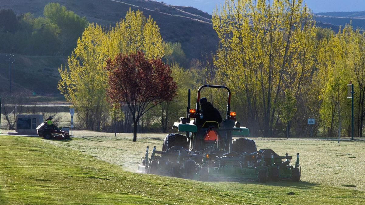 Boise Parks & Recreation crews mow the grass fields at Optimist Youth Sports Complex Thursday, April 29, 2021.