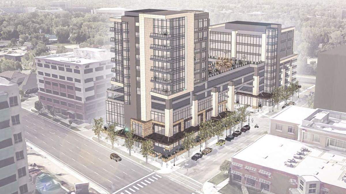 An artist’s rendering shows how two buildings proposed for 5th and Broad streets in Downtown Boise would be linked by a sky bridge and a landscaped terrace. Front Street is in the foreground, with Concordia University School of Law at lower right.