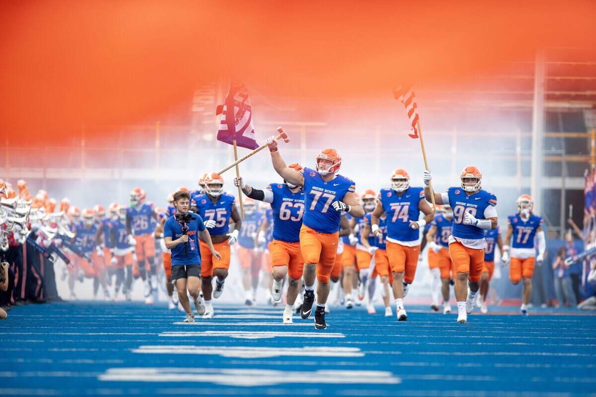 Boise State offensive tackle Kage Casey carries the hammer into Albertsons Stadium. Boise State defeated Eastern Washington 51-14 in the Broncos' home opener at Albertsons Stadium, Sept. 5, 2025.