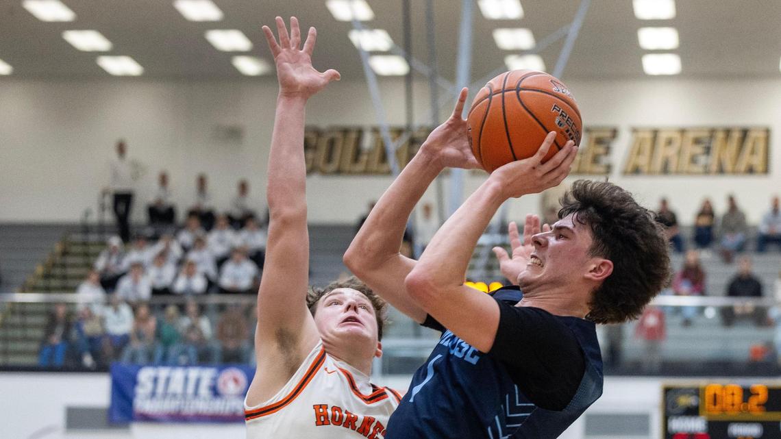Ambrose senior Lincoln Mathis, right, was voted the 3A WIC Player of the Year by the league’s coaches.