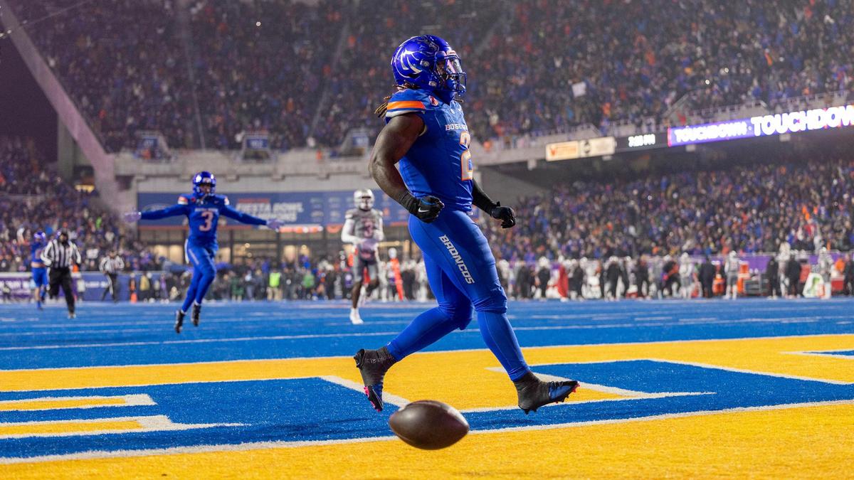 Boise State running back Ashton Jeanty enjoys the roar of Bronco Nation after a 75-yard rushing touchdown against UNLV near the end of the first half of the Mountain West championship game at Albertsons Stadium on Dec. 6.