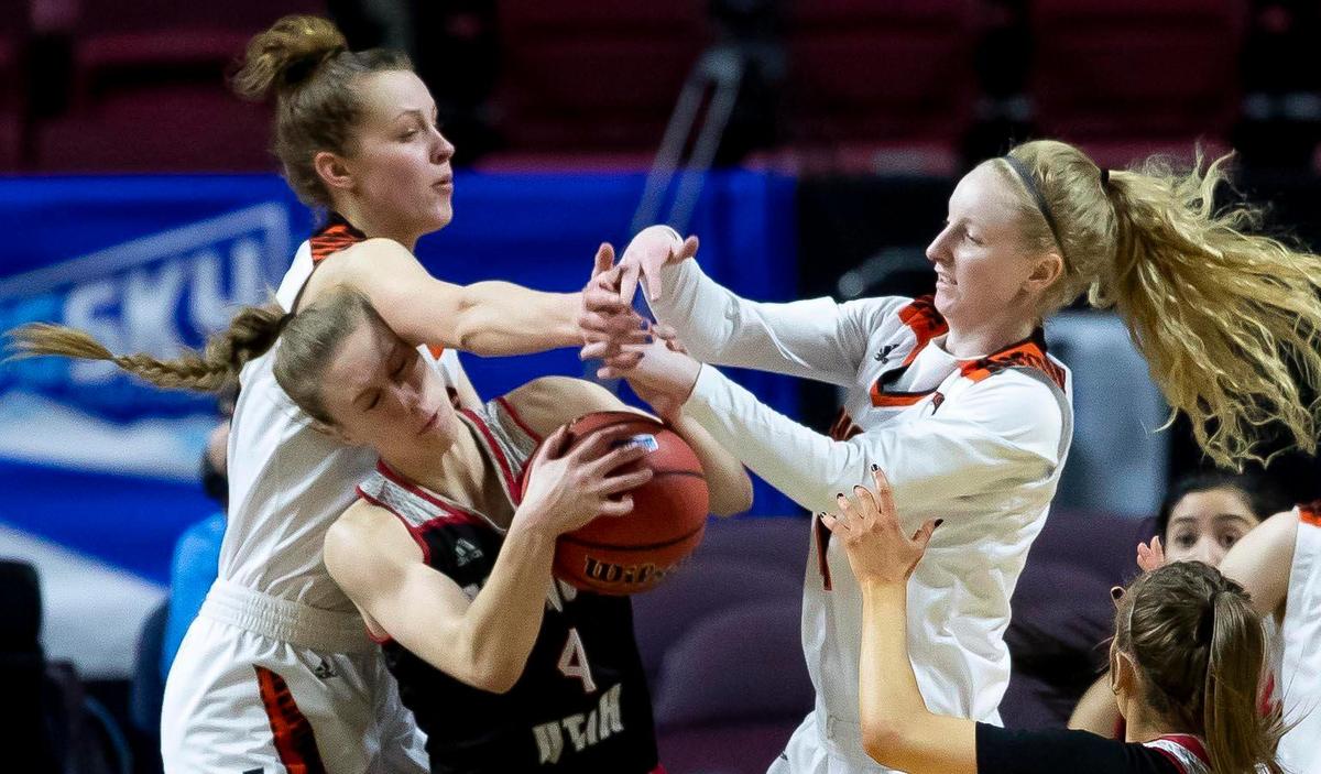 Southern Utah forward Ashley Larsen brings down an offensive rebound under the arms of Idaho State forward Ellie Smith and guard Carsyn Boswell in the Big Sky women’s basketball tournament Tuesday, March 10, 2020 at CenturyLink Arena in Downtown Boise.