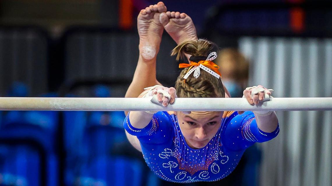 Boise State gymnast Talia Little competes on the uneven bars during the Broncos’ home opener against No. 20 Southern Utah on Friday at ExtraMile Arena. Little is a published author. She wrote her book, “Not One of Them,” at the age of 16 and just recently had it published.