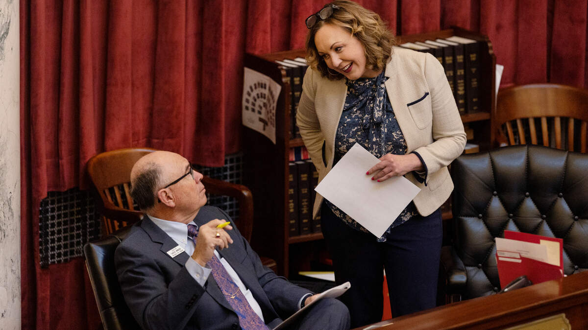 Senate President Pro Tem Chuck Winder, R-Boise, talks with Assistant Majority Leader Abby Lee, R-Fruitland, before the start of the Senate session on Wednesday, March 16, 2022. Senate Republican leaders are circulating a petition to convene a special session that would address problems with next year’s presidential primary election.