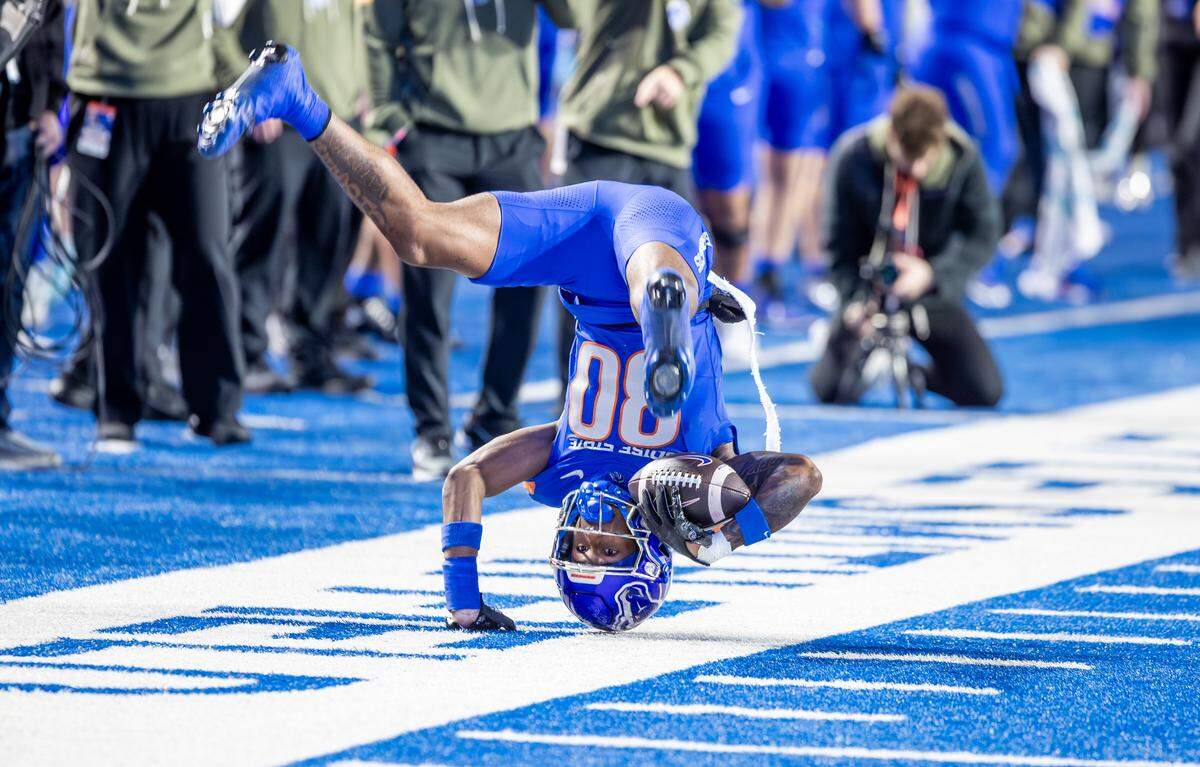 Cam Bates ends up on his head after a first-down catch during the first half of the game against Colorado State on Nov. 22 in Boise. Boise State won 49-21.