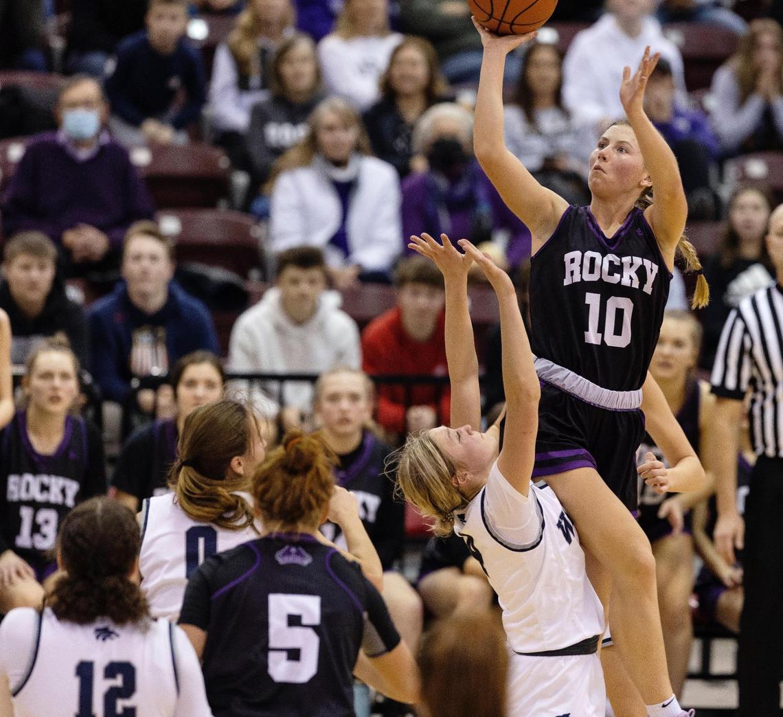 Rocky Mountain’s Brielle Magnuson rises above the Lake City defense and draws a foul during last year’s 5A state tournament.